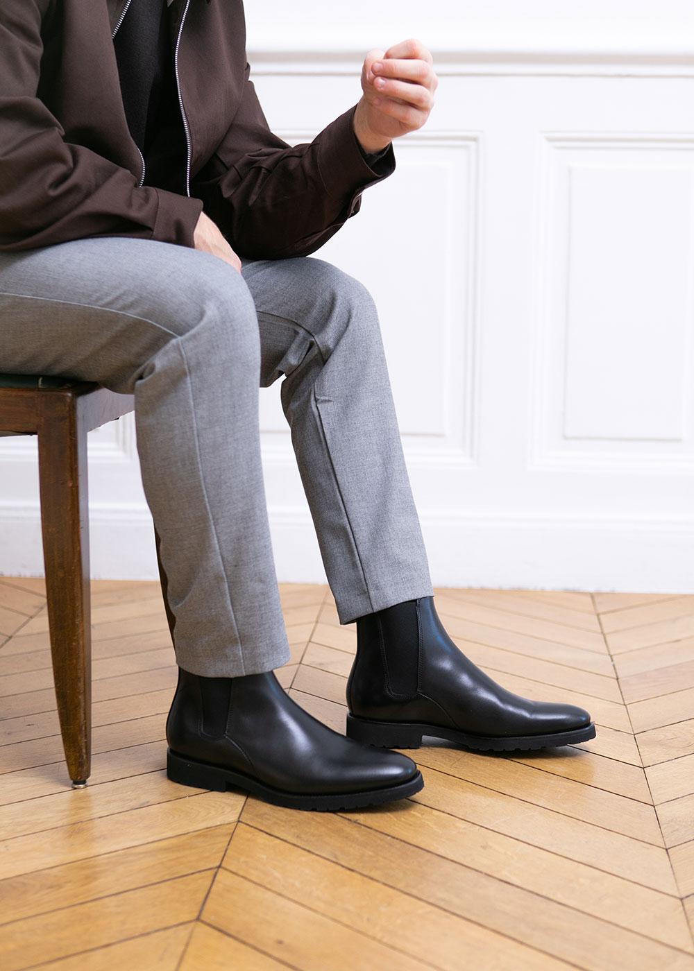 Men wearing black chelsea boots store